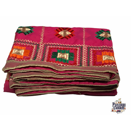 Beautiful Fulkari with hot pink base and multi color flower pattern+ golden lace on all the borders